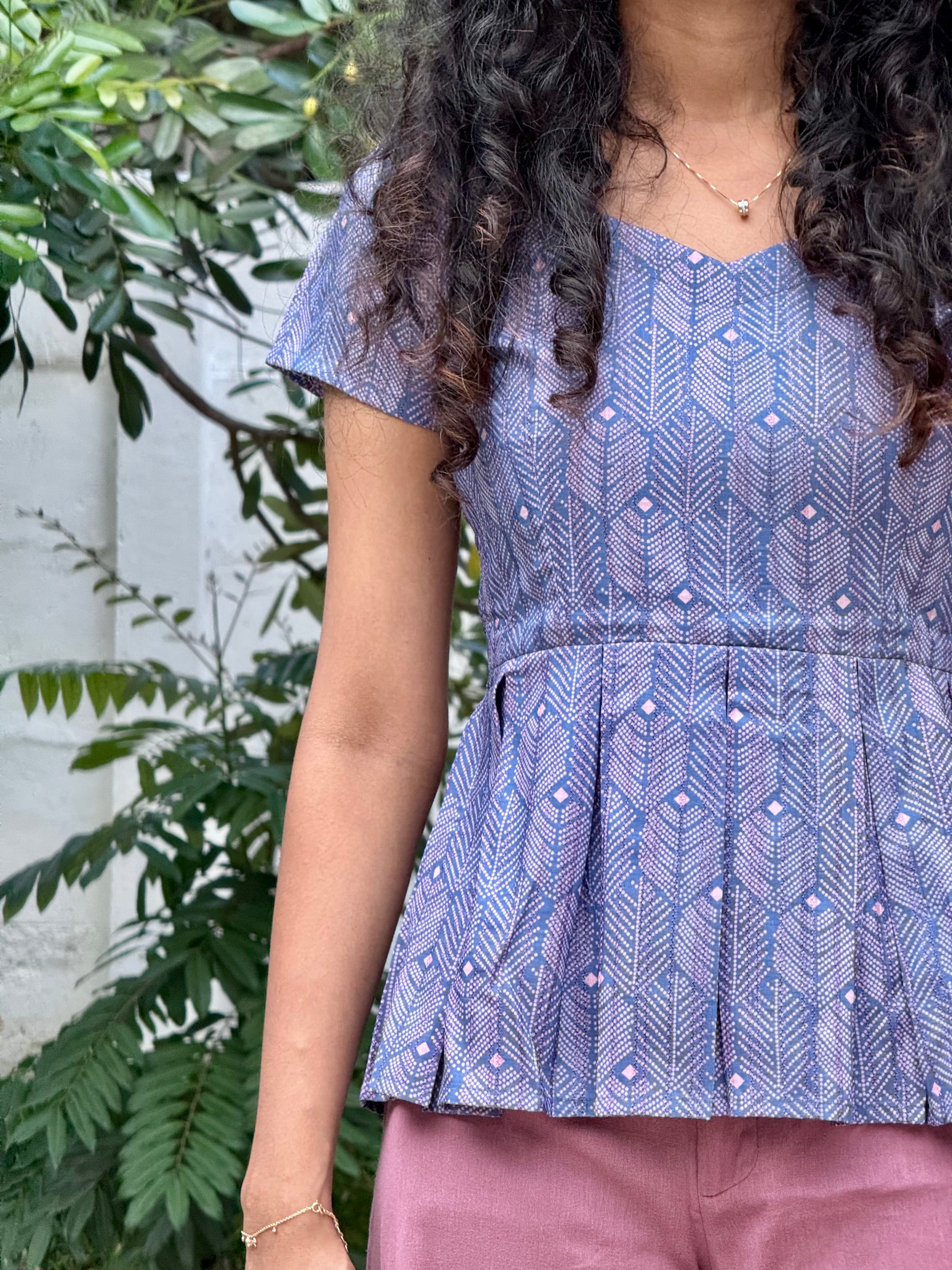 Blue peplum top