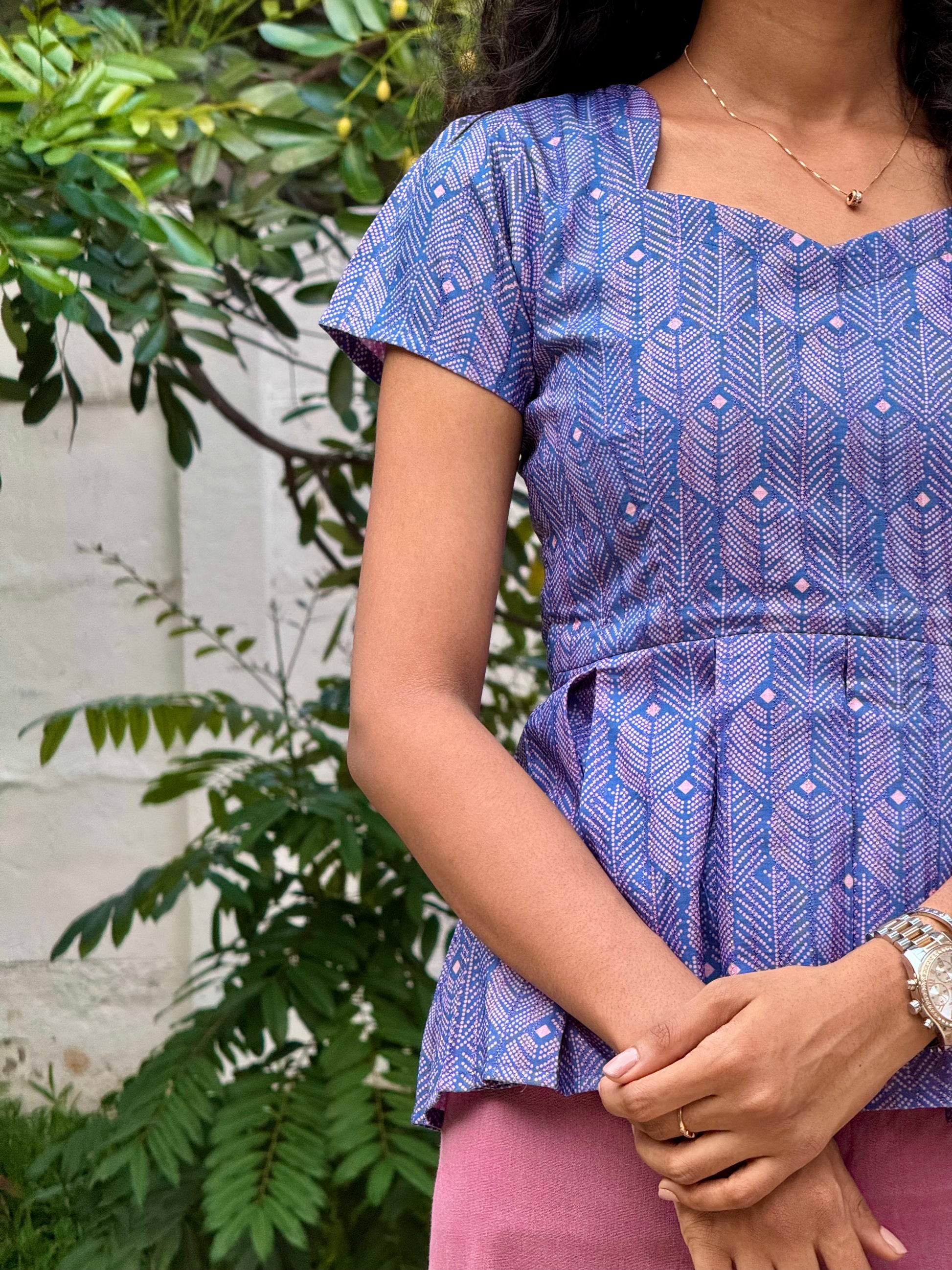 Blue peplum top